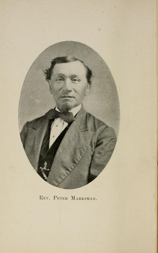 A printed oval portrait of a seated man in a dark suit, with the caption Rev. Peter Marksman retained below.