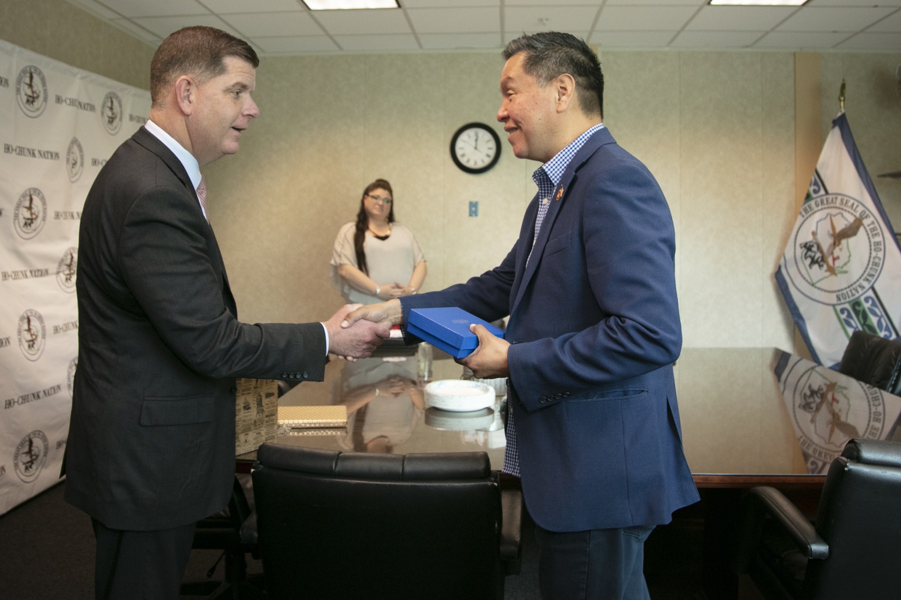 Marty Walsh and then Ho-Chunk Nation President Marlon WhiteEagle shake hands at the Nation’s offices in2021.