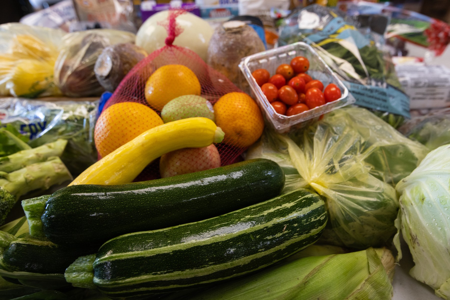 Produce and packaged foods in a USDA photograph documenting Red Cliff food distribution in August 2023.